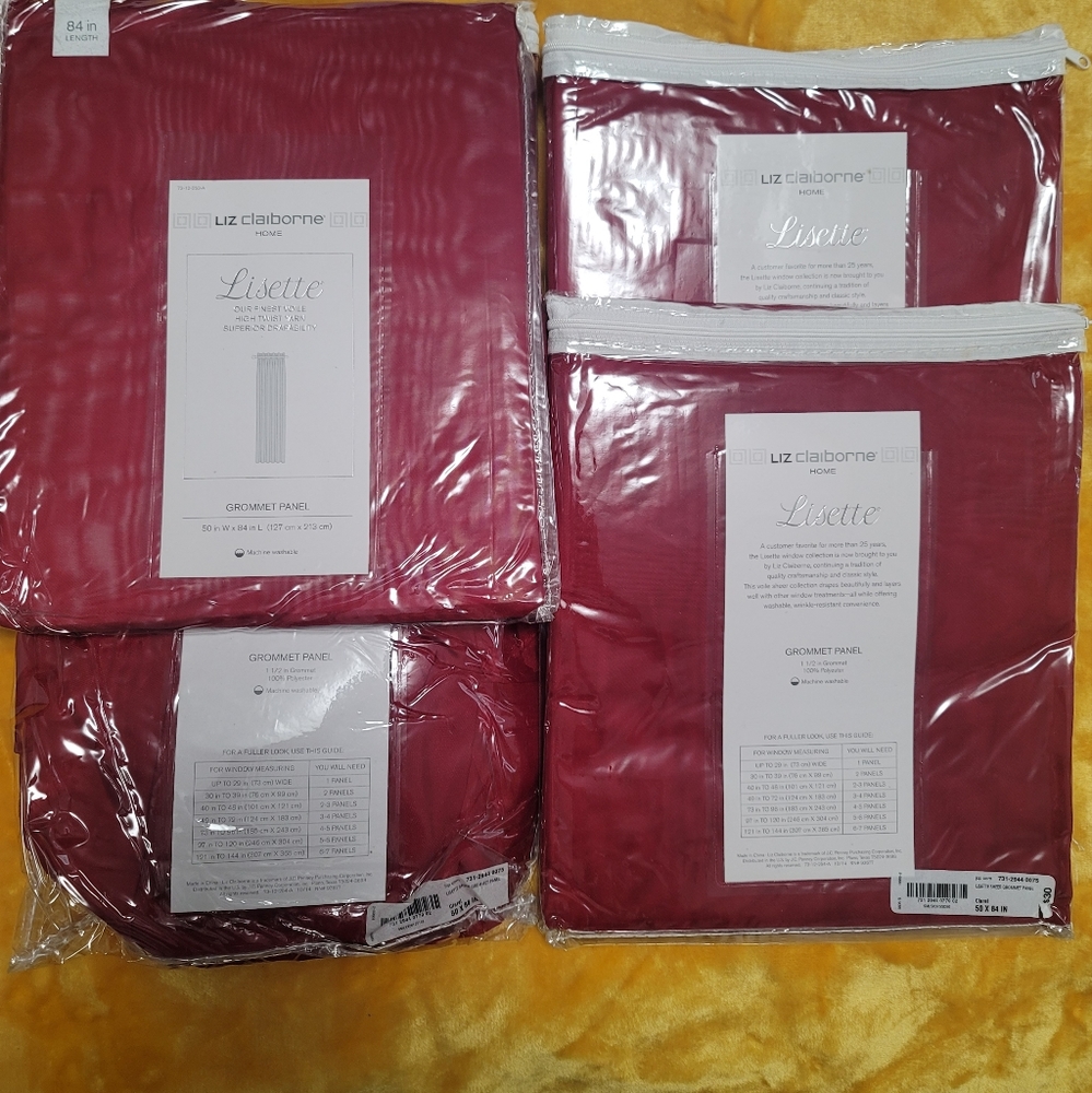 Set of 2 Burgundy Sheer Gromet curtains. Never used (NWT)